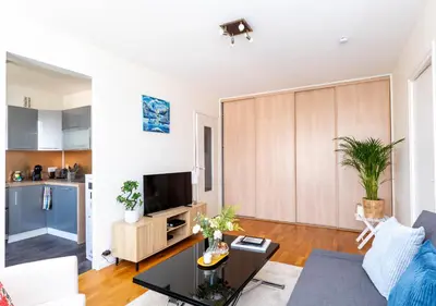 Télévision ou salle de divertissement dans l'établissement Appartement T2, fonctionnel, Parking,balcon ,2 minutes gare ,17 minutes Paris