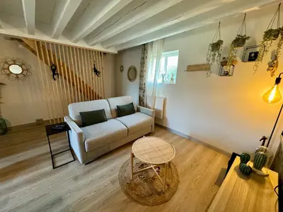 Coin salon dans l'établissement Le Cocon de Thoiry