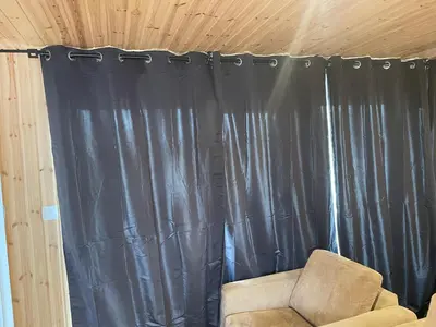 Coin salon dans l'établissement Le Chalet d'Amélia