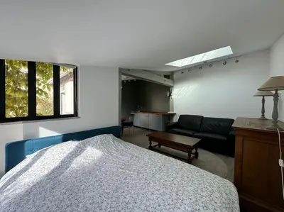 Un ou plusieurs lits dans un hébergement de l'établissement Petite maison indépendante avec parking
