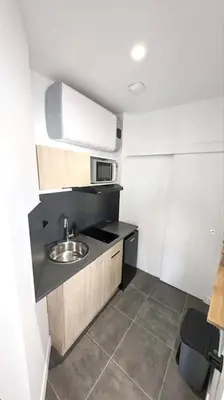 Cuisine ou kitchenette dans l'établissement Le CinéChic RDC