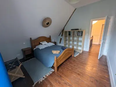 Un ou plusieurs lits dans un hébergement de l'établissement Au Bonheur des Voyageurs, 30' de Paris