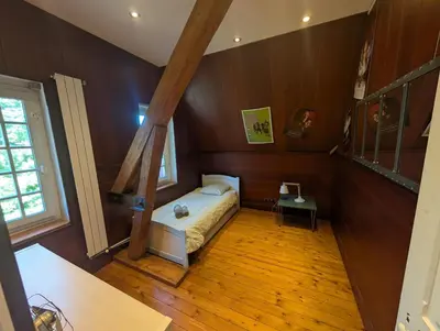 Un ou plusieurs lits dans un hébergement de l'établissement Au Bonheur des Voyageurs, 30' de Paris