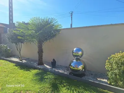 Jardin de l'établissement Charmante maisonnette équipée