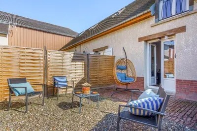 Terrasse ou espace extérieur de l'établissement Maisonnette Bleu Horizon avec jardin - 2min Gare - Serenito Homes