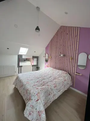 Un ou plusieurs lits dans un hébergement de l'établissement Love room jacuzzi proche centre ville