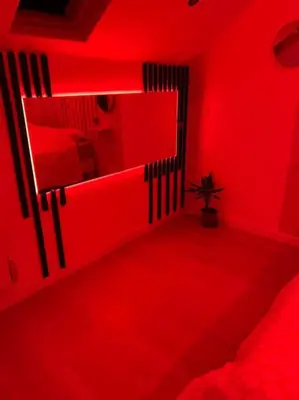 Un ou plusieurs lits dans un hébergement de l'établissement Love room jacuzzi proche centre ville