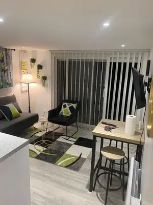 Coin salon dans l'établissement Auxilia Home