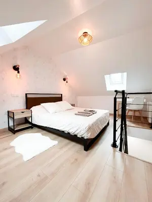 Un ou plusieurs lits dans un hébergement de l'établissement Maison Cosy Centre Gare Amiens
