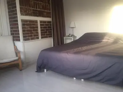 Un ou plusieurs lits dans un hébergement de l'établissement Grande maison à 1H de la mer et 1H de Paris