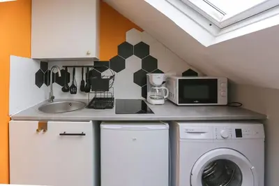 Cuisine ou kitchenette dans l'établissement Le Nid d Amiens 2 pers 8 min Centre ville & gare