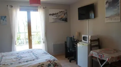 Télévision ou salle de divertissement dans l'établissement Chambres d'Hôtes de Boudeville