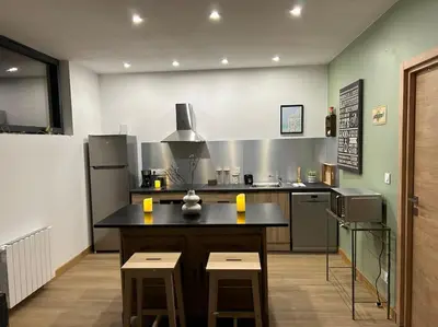 Cuisine ou kitchenette dans l'établissement Gites les Amourettes
