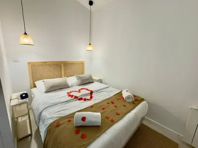 Un ou plusieurs lits dans un hébergement de l'établissement Romantique Room - Cinéma - Netflix - St Roch