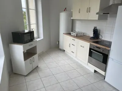 Cuisine ou kitchenette dans l'établissement Appartement berges Oise