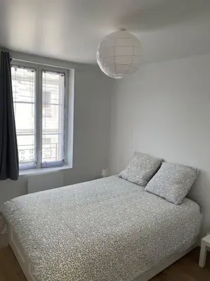 Un ou plusieurs lits dans un hébergement de l'établissement Appartement berges Oise