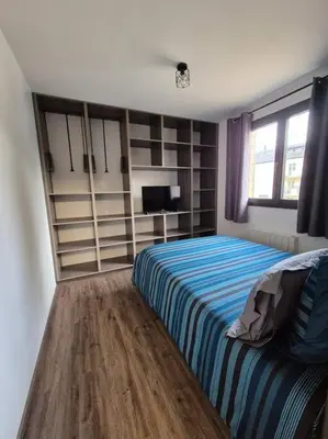 Un ou plusieurs lits dans un hébergement de l'établissement Appartement centre-ville 1