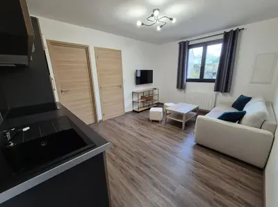 Télévision ou salle de divertissement dans l'établissement Appartement centre-ville 1