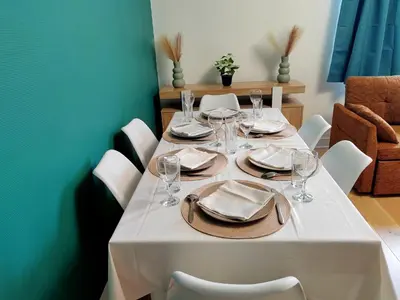 Coin salon dans l'établissement Appartement en centre ville - 5 min de la Gare - 62 m2 - 1 à 6 pers