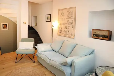 Coin salon dans l'établissement Maison l'Héritage by La Boîte en Plus