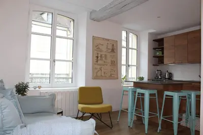 Coin salon dans l'établissement Maison l'Héritage by La Boîte en Plus