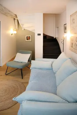 Coin salon dans l'établissement Maison l'Héritage by La Boîte en Plus