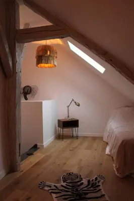 Un ou plusieurs lits dans un hébergement de l'établissement Maison l'Héritage by La Boîte en Plus