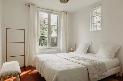 Un ou plusieurs lits dans un hébergement de l'établissement La Dime de Giverny - Cottages-Spa-restaurant