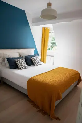 Un ou plusieurs lits dans un hébergement de l'établissement Villa des Saules