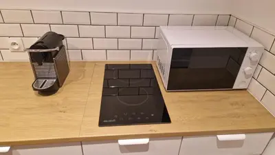 Cuisine ou kitchenette dans l'établissement Gite dans une maison normande