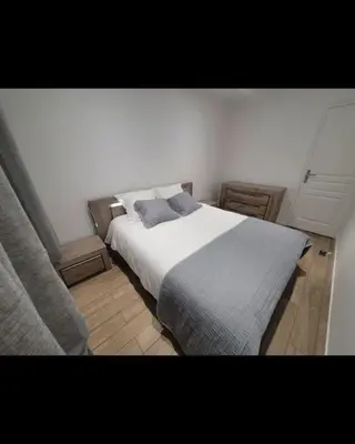 Un ou plusieurs lits dans un hébergement de l'établissement Maison au pied de la forêt
