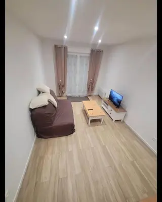 Coin salon dans l'établissement Maison au pied de la forêt