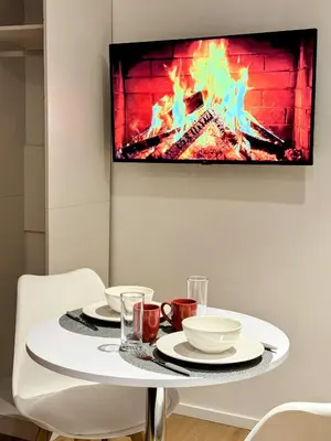Télévision ou salle de divertissement dans l'établissement Terra Cotta 1er Étage