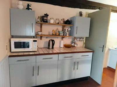 Cuisine ou kitchenette dans l'établissement Chez Johns