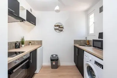 Cuisine ou kitchenette dans l'établissement Le Garden C