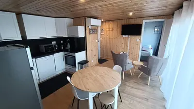 Cuisine ou kitchenette dans l'établissement Le Chalet Léna