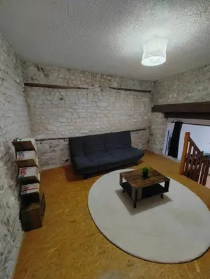 Coin salon dans l'établissement Cosy Ciné 8
