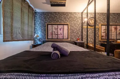 Un ou plusieurs lits dans un hébergement de l'établissement 50 Nuances de Bonheur - Love Room à Rouen