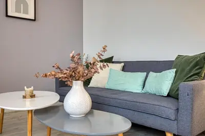Coin salon dans l'établissement Flaubert appartement avec parking idéal au cœur du centre-ville