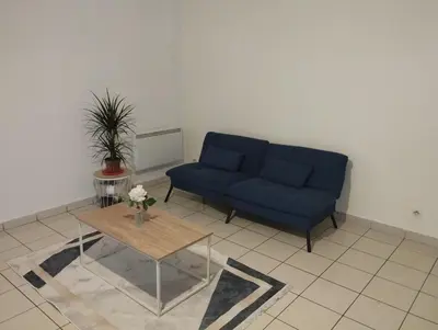 Coin salon dans l'établissement appartement entier 2 chambres