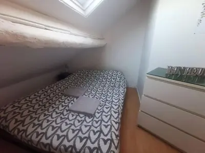 Un ou plusieurs lits dans un hébergement de l'établissement Duplex House Paris-CDG-Astérix