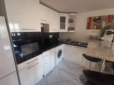 Cuisine ou kitchenette dans l'établissement Duplex House Paris-CDG-Astérix