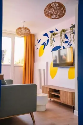 Télévision ou salle de divertissement dans l'établissement Studio Majorelle