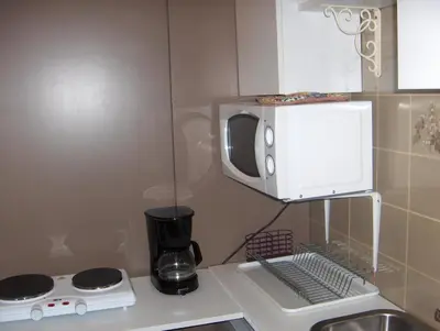 Cuisine ou kitchenette dans l'établissement Ilvil