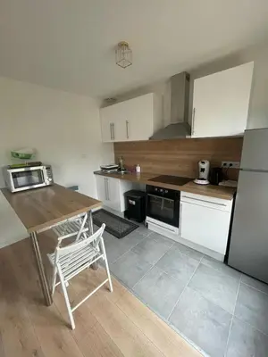 Cuisine ou kitchenette dans l'établissement Maison familiale proche Paris