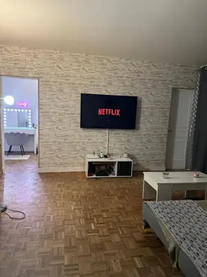 Télévision ou salle de divertissement dans l'établissement Cosy nest