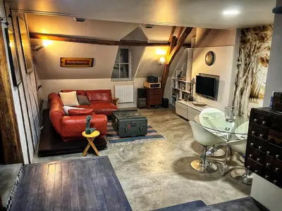 Coin salon dans l'établissement Duplex à Senlis