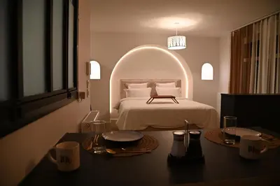 Un ou plusieurs lits dans un hébergement de l'établissement Suite and spa jacuzzi sauna proche Paris