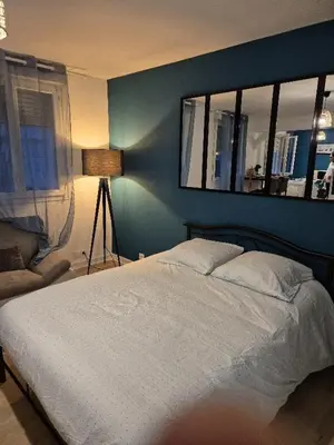 Un ou plusieurs lits dans un hébergement de l'établissement Charmant studio proche de Rouen