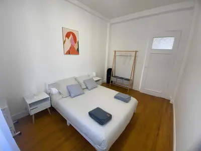 Un ou plusieurs lits dans un hébergement de l'établissement Coeur de ville - Appartement 2 chambres